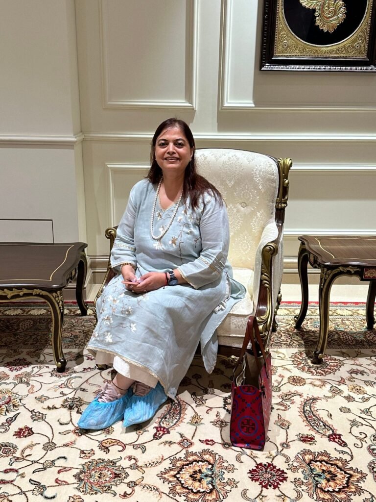 Monica Sharma, co-founder of Morbagh Designs, seated in a Morbagh armchair at Bharat Mandapam, New Delhi