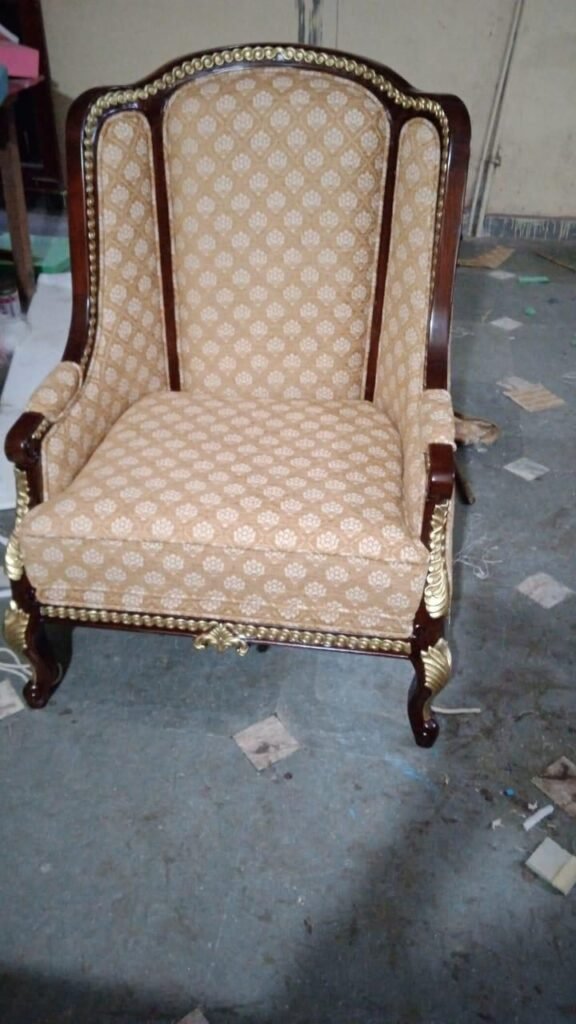 Carved wingback armchair with gilded trim in production at the Morbagh workshop, made for the G20 Leaders Summit
